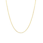 Gold chain necklace on a white background