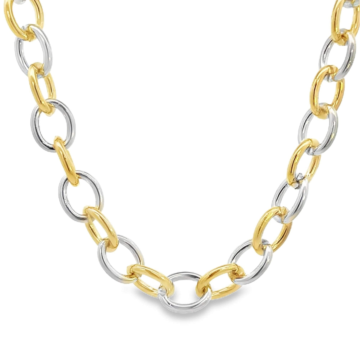 Two-tone gold and rhodium chain necklace on a white background
