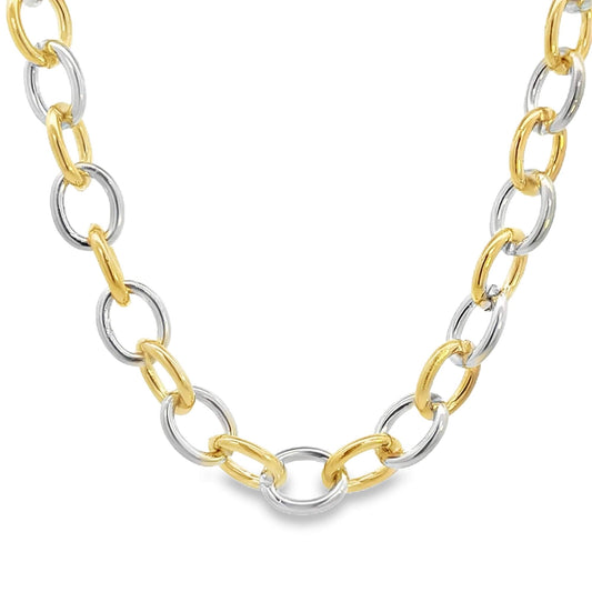 Two-tone gold and rhodium chain necklace on a white background