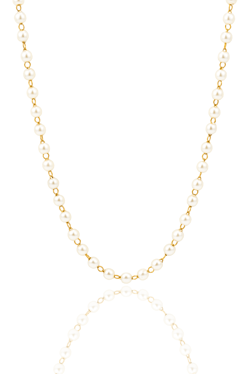 An elegant gold and pearl station necklace gleams against a white background, casting a soft reflection below.