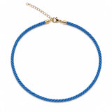 Modern twisted color cord choker necklace featuring 18K Gold Filled hardware and adjustable chain. Lightweight, stylish, and available in multiple colors.
