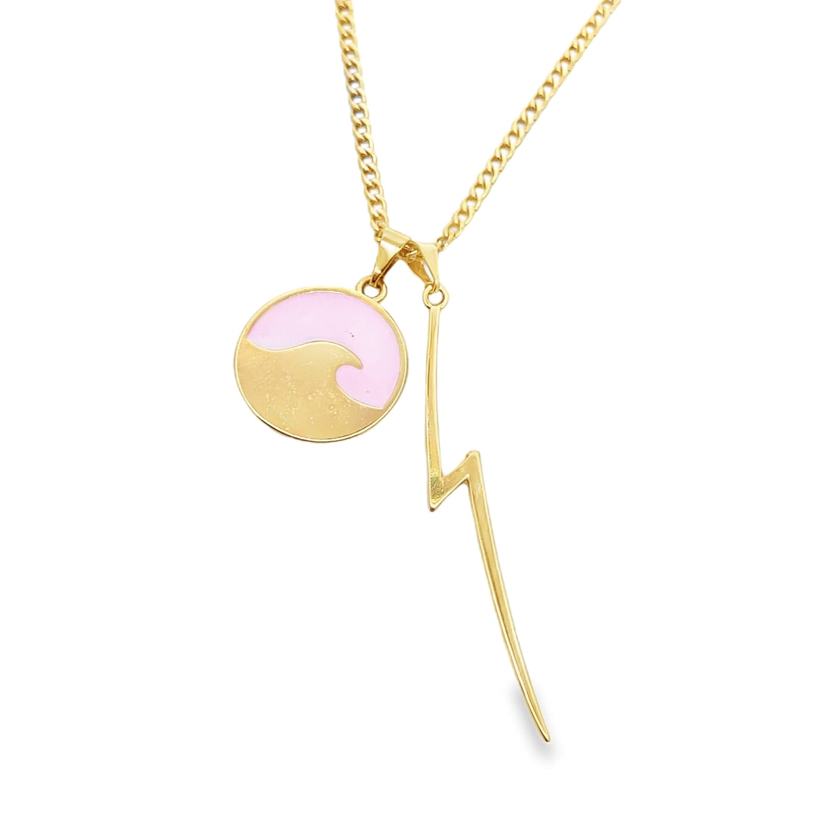A gold chain necklace displays a circular pink enamel wave pendant and a matching lightning bolt charm.