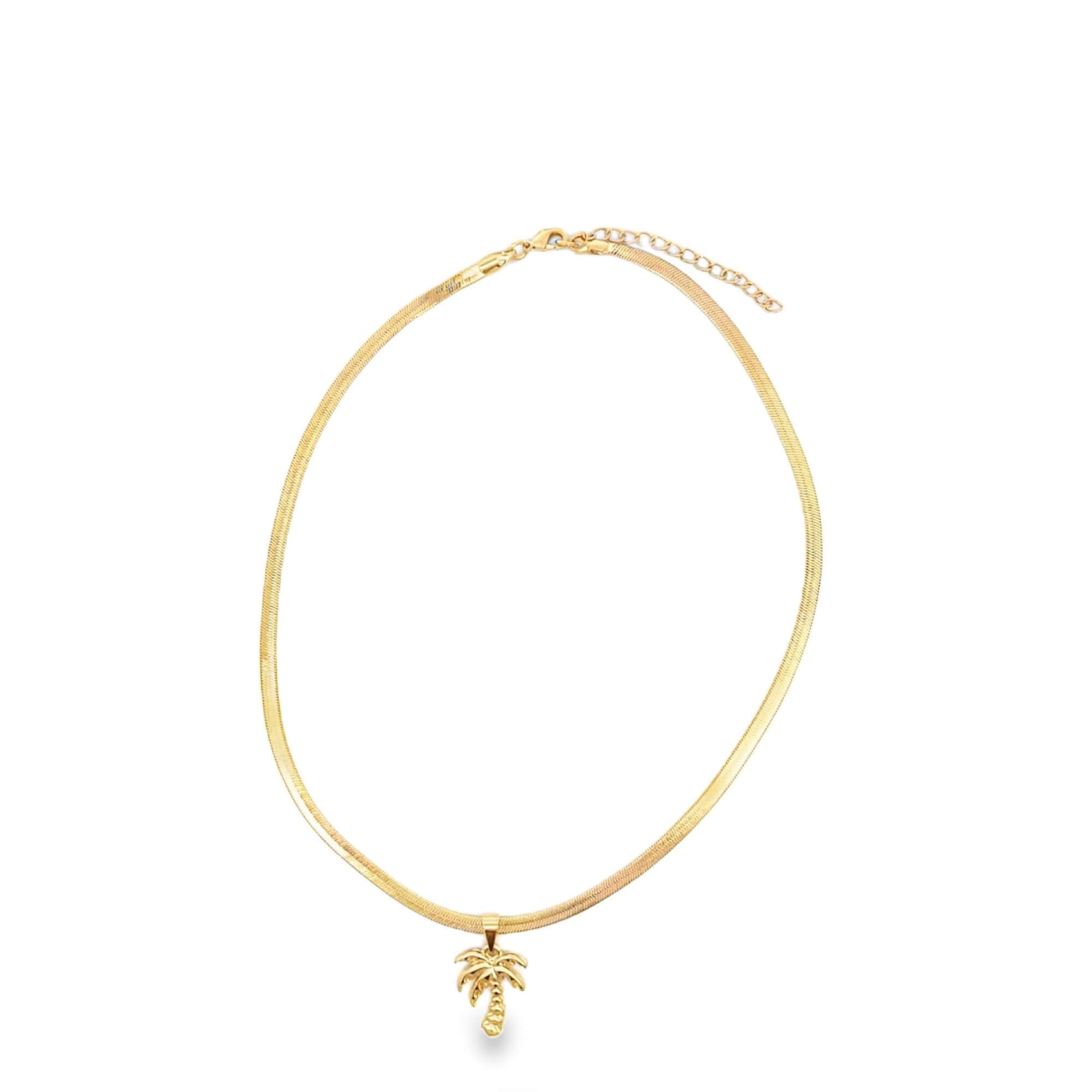A gold herringbone chain necklace drapes with a delicate palm tree pendant against a white background.