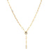 A delicate gold paperclip chain necklace features a sparkling bezel-set oval gemstone hanging in a Y-shape against a clean white background.
