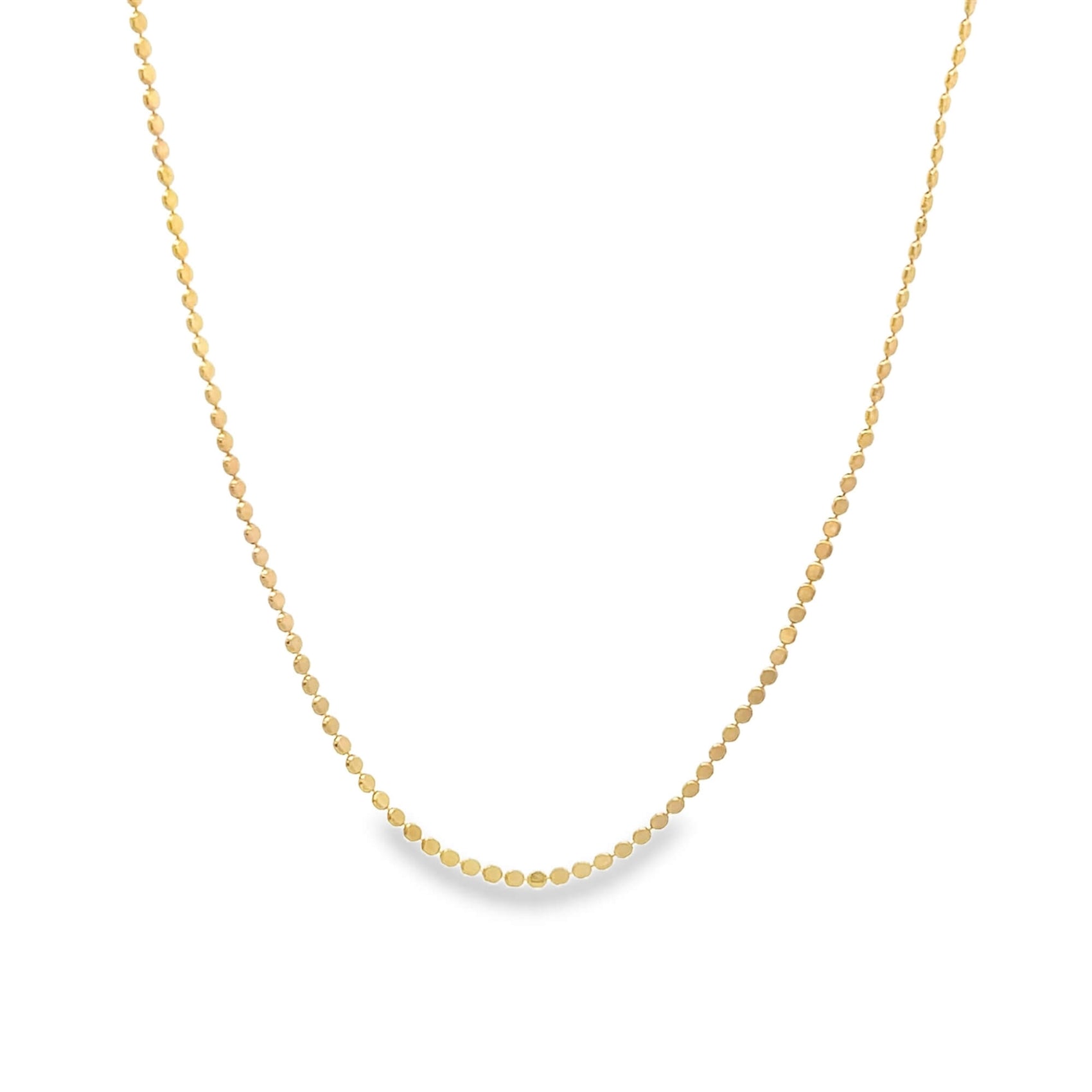 A delicate gold satellite chain necklace hangs against a clean white background.
