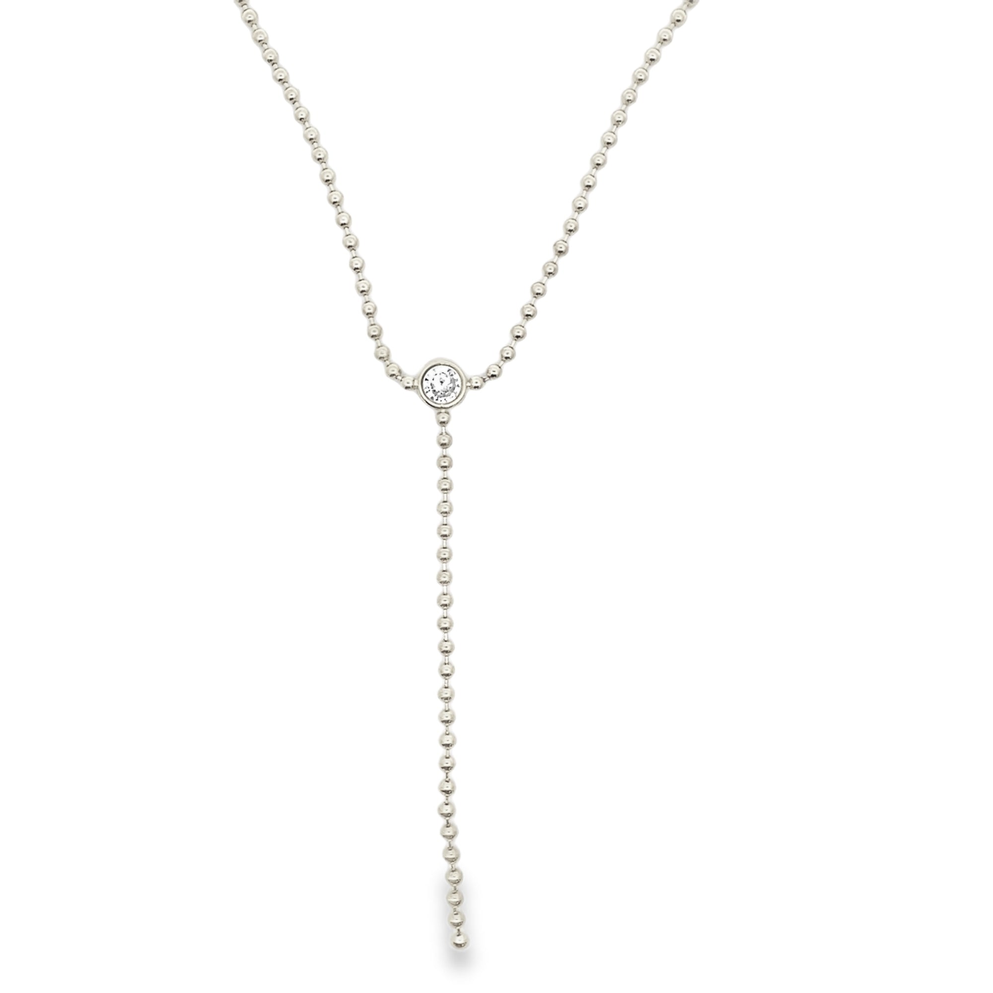 Elegant beaded lariat necklace with bezel-set stone and drop chain. Minimalist Y necklace available in gold or silver. Perfect for everyday wear or layering.