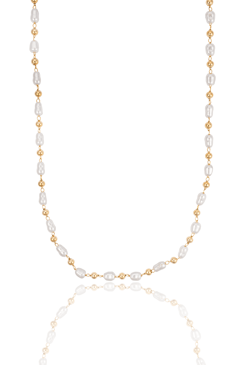 A delicate gold and baroque pearl beaded necklace drapes gracefully against a clean white background, reflecting softly on the surface below.