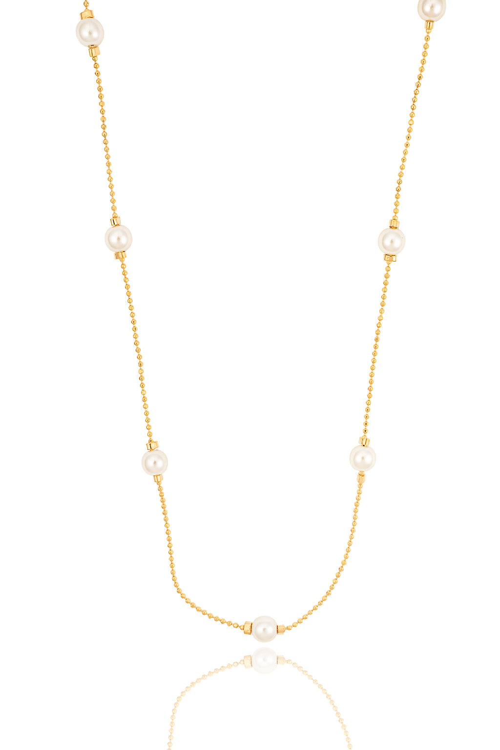 A delicate gold chain necklace with evenly spaced white pearls hangs against a clean white background.