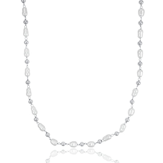 A delicate silver beaded necklace features alternating baroque freshwater pearls and metal spheres against a white background.