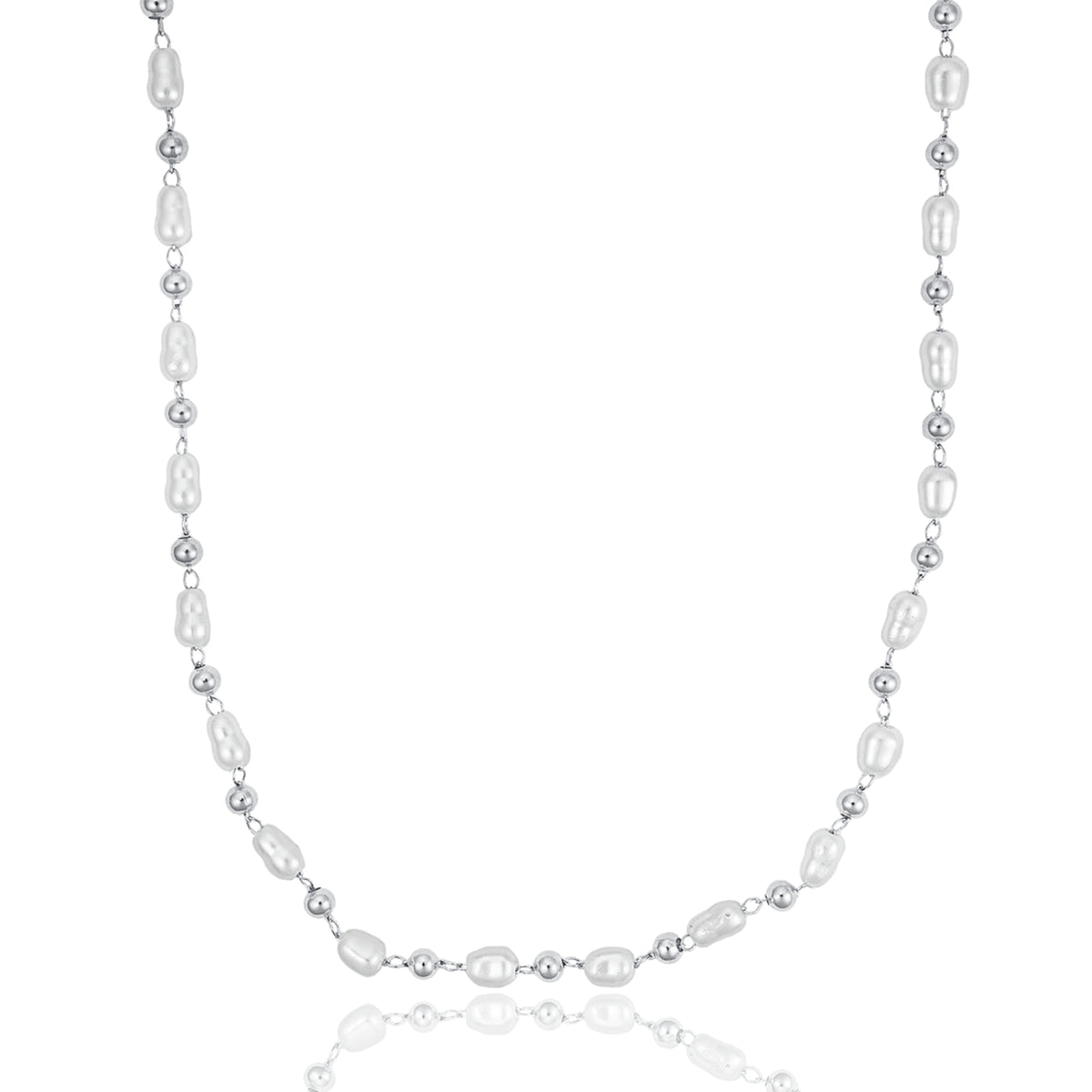 A delicate silver chain necklace features alternating white baroque pearls and small metallic beads against a white background.