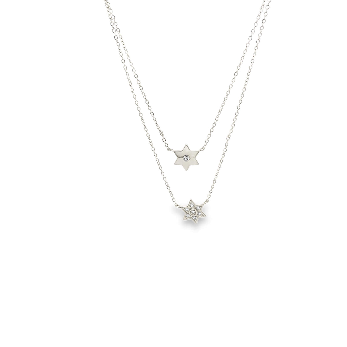 Silver star-shaped necklace on a white background