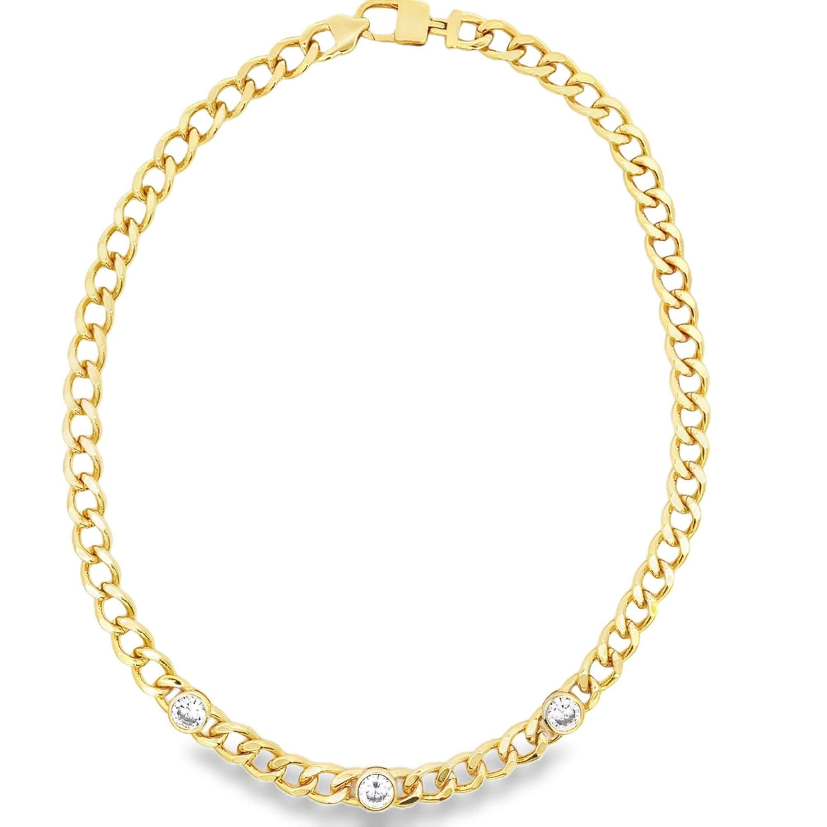 A sparkling gold Cuban link chain necklace features three round diamond bezel-set stones accenting the front.