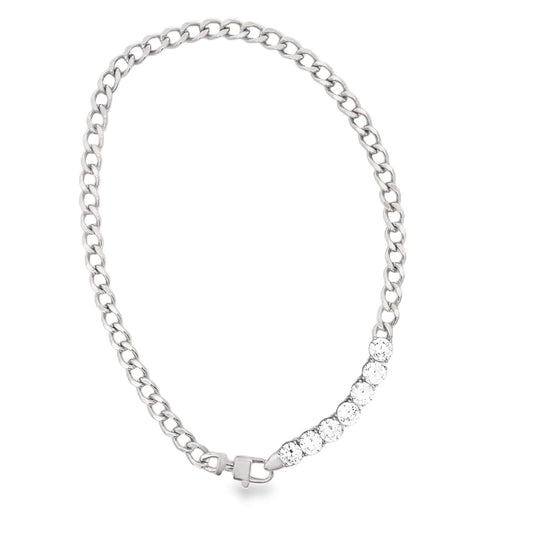 A sterling silver curb chain necklace features a graduated row of sparkling cubic zirconia stones set along one side.
