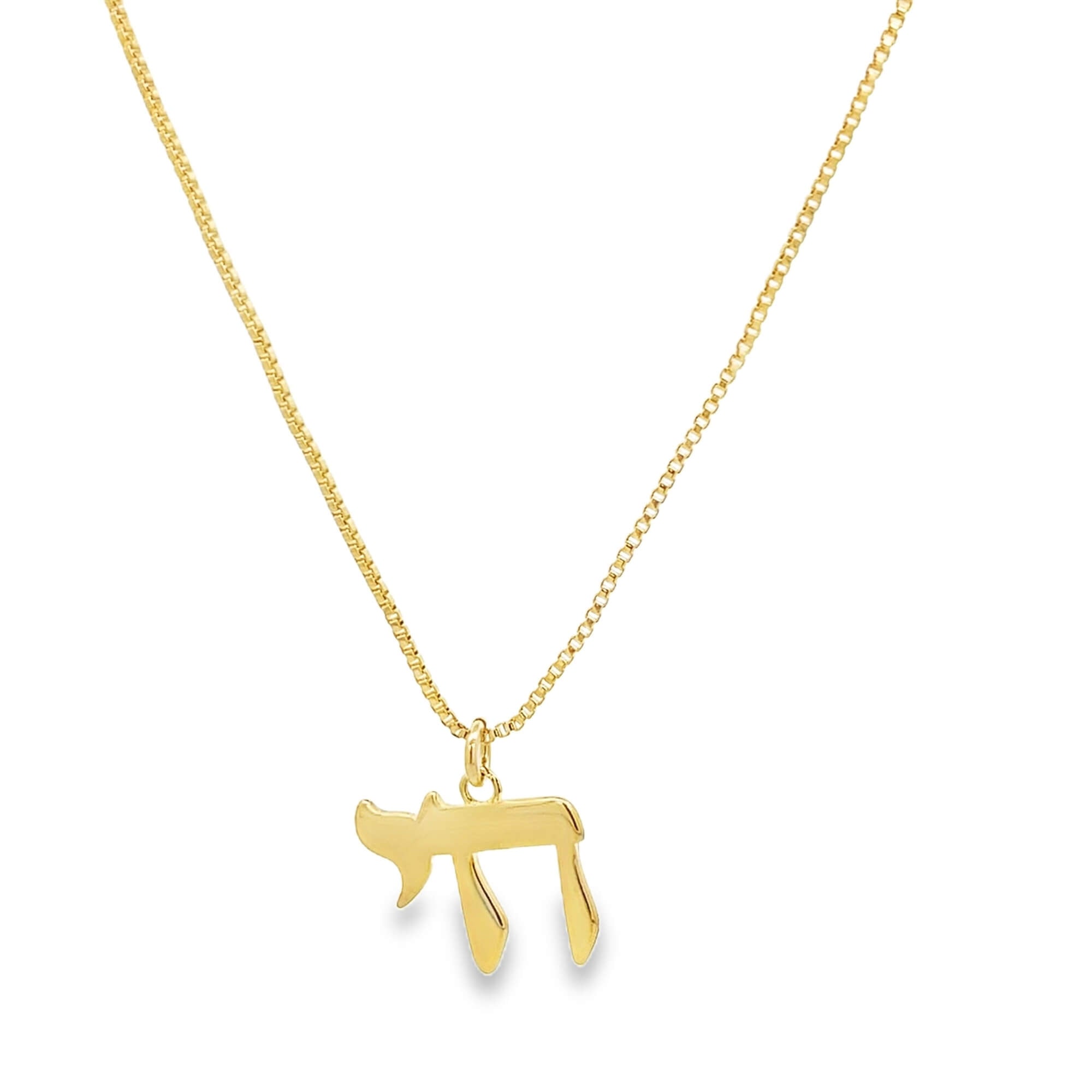 Gold necklace with a Hebrew letter 'Chai' pendant on a white background