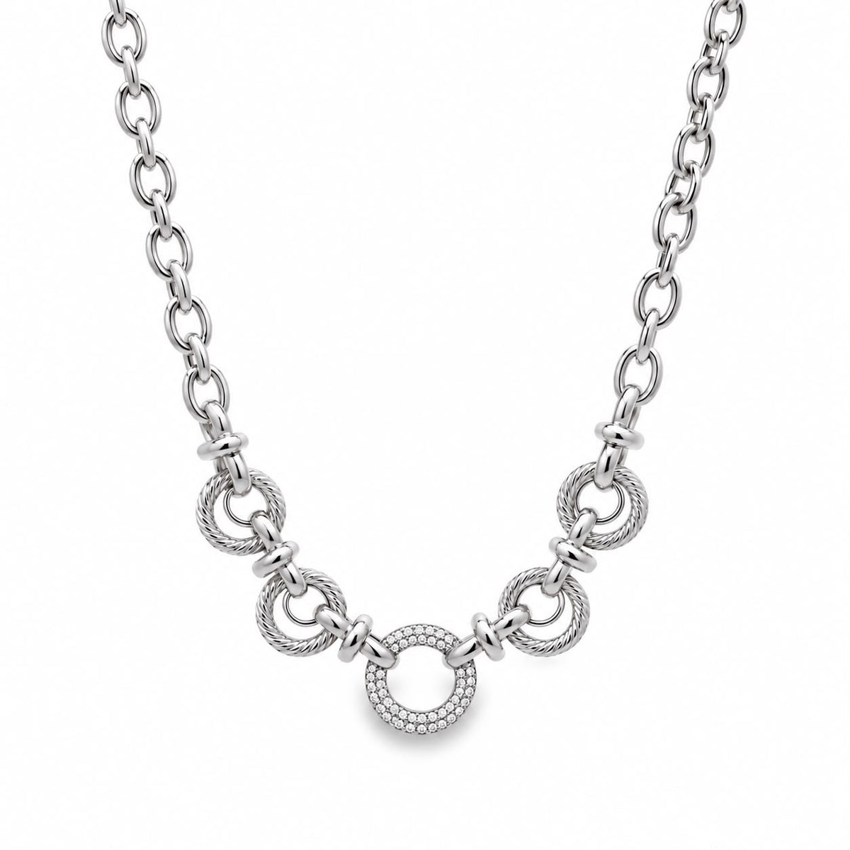 Shop a modern textured circle link necklace featuring a pavé CZ centerpiece. Available in 18K Gold Filled and Rhodium Filled finishes for an elegant statement look.