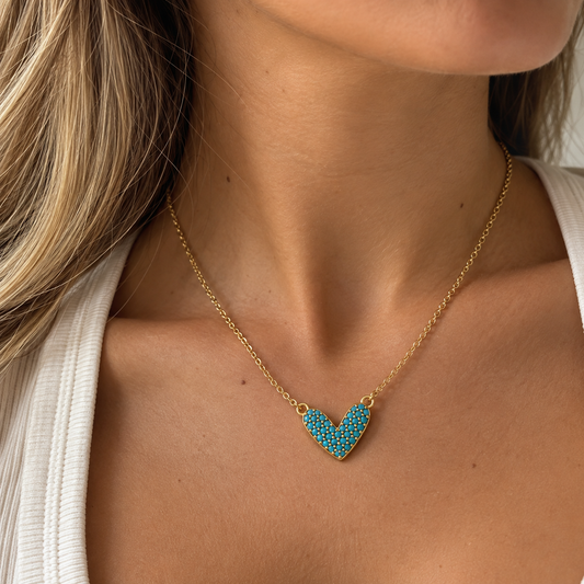 Shop elegant 18K Gold Filled heart jewelry in Clear or Turquoise. Choose from heart stud earrings or a delicate choker necklace. Sold separately.