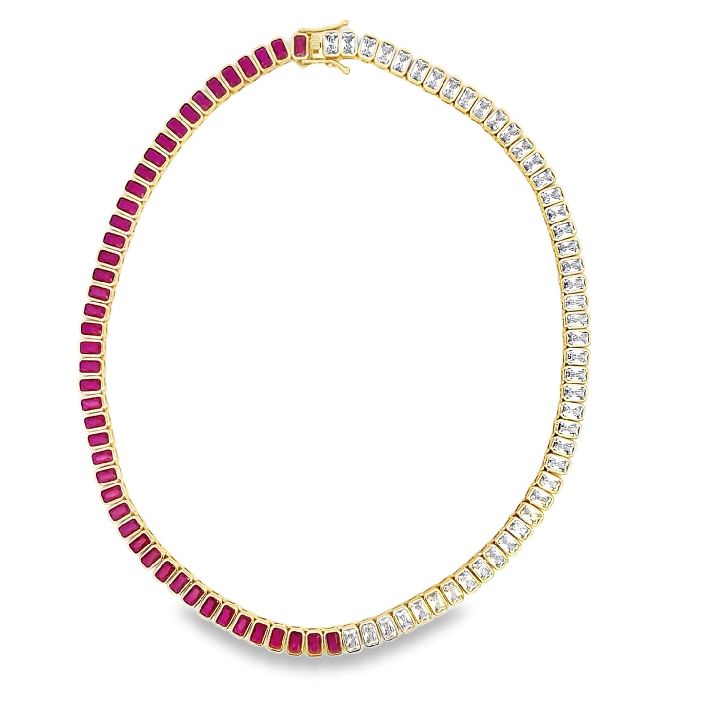 A stunning gold tennis necklace features an alternating gradient of vibrant ruby-red stones and sparkling cubic zirconia crystals.