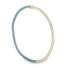 A gold tennis necklace features alternating sections of rectangular turquoise stones and sparkling white diamonds.