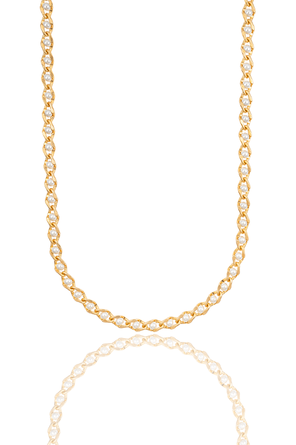 A gold chain necklace intertwined with white pearls hangs against a clean white background with its reflection below.