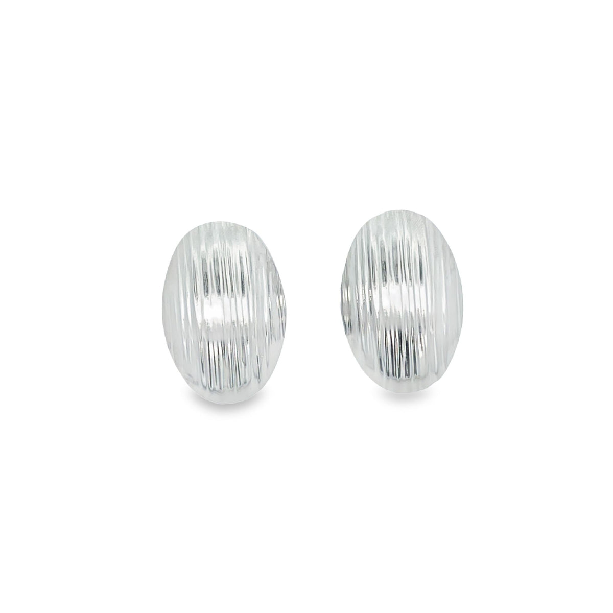A pair of shiny silver oval stud earrings features vertical ridged textures against a clean white background.