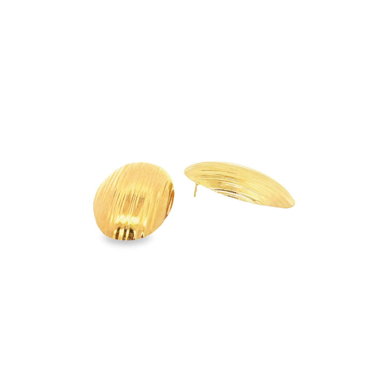 A pair of textured gold oval stud earrings rests against a clean white background.