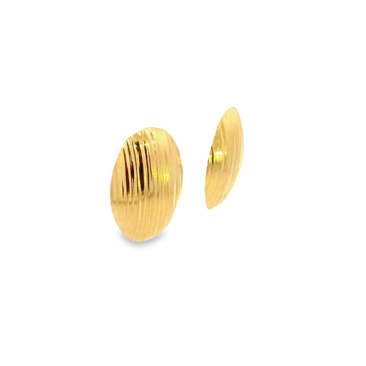 A pair of gold textured dome earrings showcase a polished, ridged surface against a plain white background.