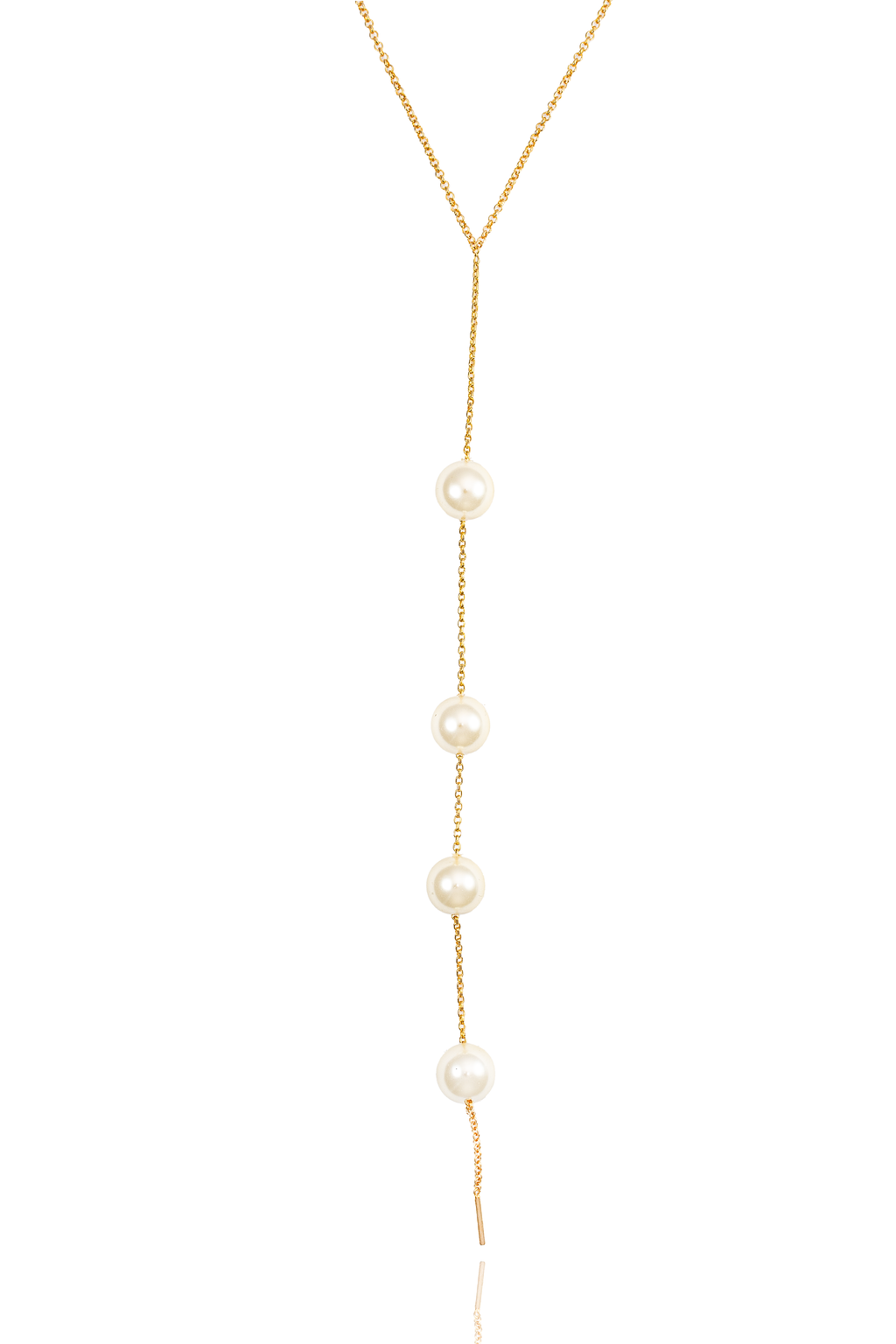 A delicate gold lariat necklace drapes vertically, featuring four evenly spaced white pearls.