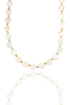 A mother-of-pearl coin bead necklace with gold spacers is displayed against a white background with a soft reflection underneath.