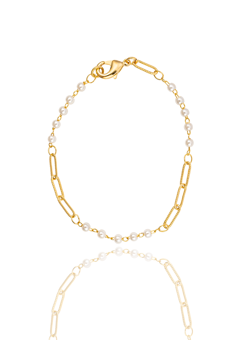 A delicate gold chain bracelet features alternating segments of small white pearls and textured paperclip links against a white background.