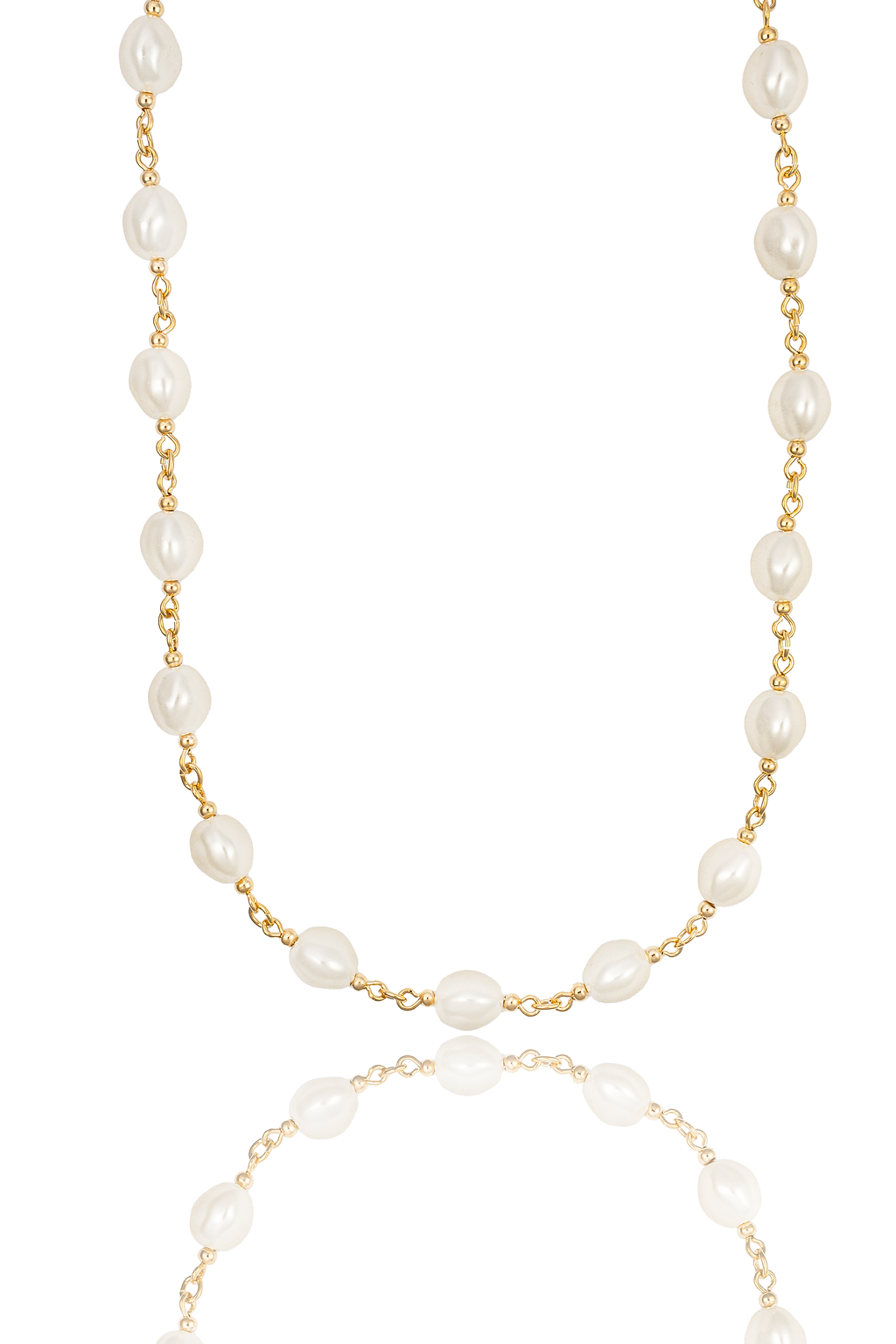 A delicate gold chain necklace with interspersed freshwater pearls rests against a clean white background with its reflection below.