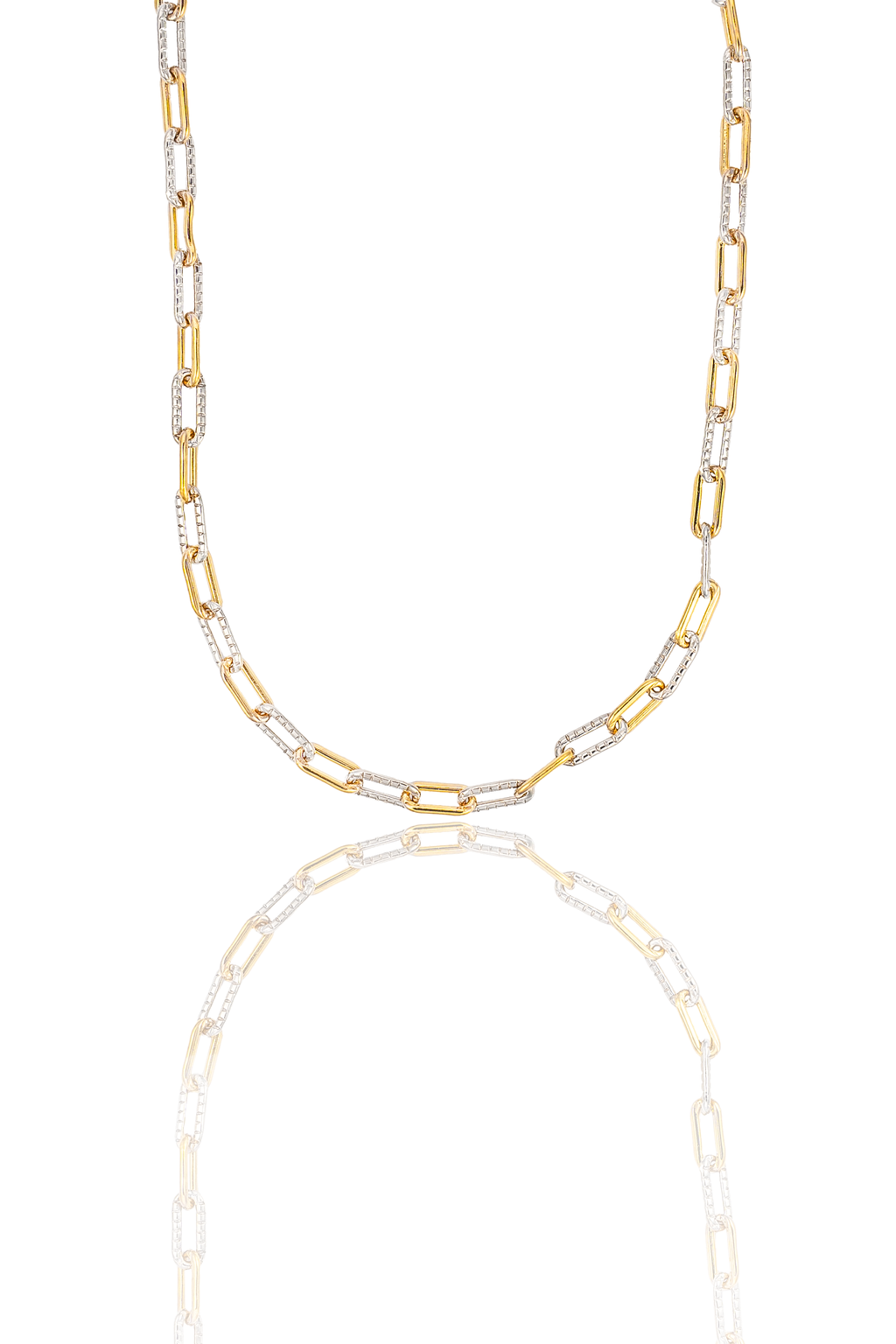 A two-tone paperclip chain necklace displays alternating links of polished yellow gold and textured white gold against a white background.