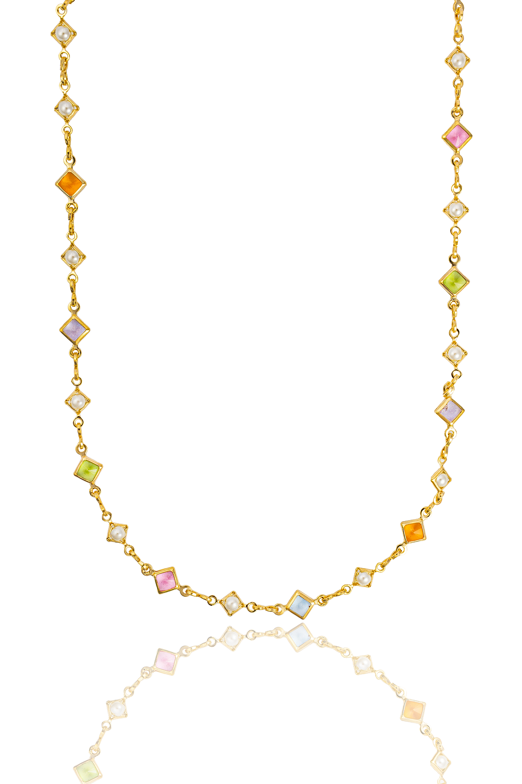 A delicate gold chain necklace sparkles with alternating colorful square gemstones and small pearls against a clean white background.