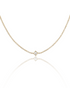 A delicate gold tennis necklace featuring a square diamond pendant sparkles against a white background, casting a soft reflection below.