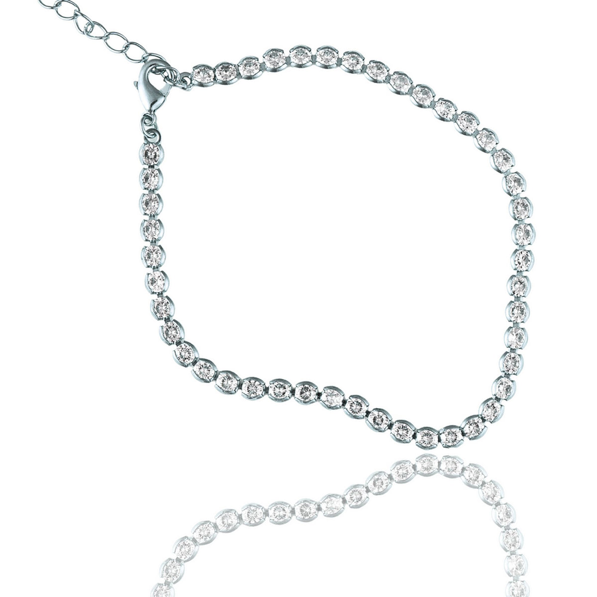A sparkling silver tennis bracelet with a clasp and extension chain rests against a white background, casting a gentle reflection below.