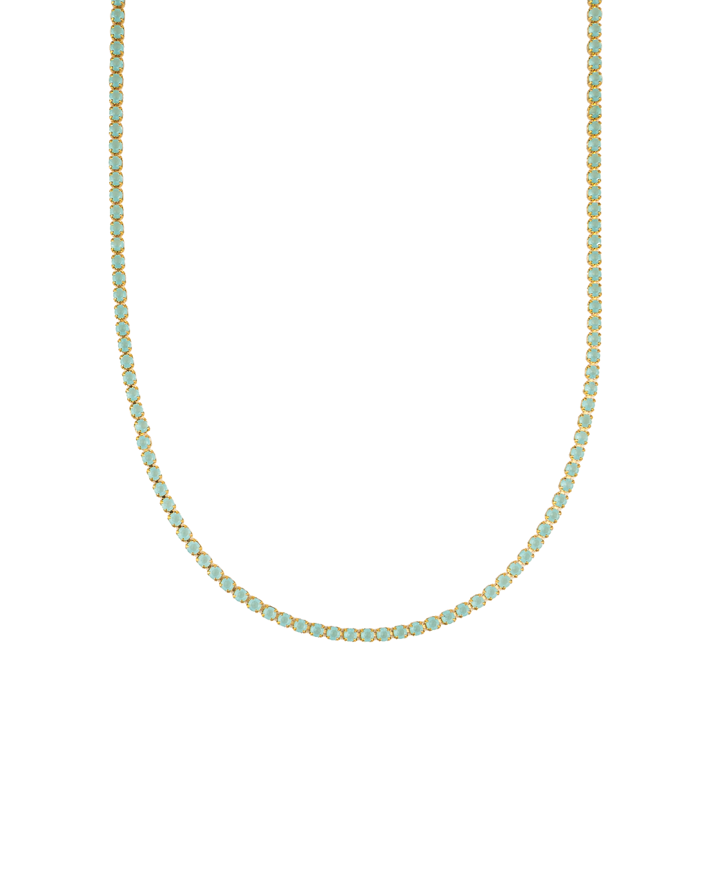 A delicate gold tennis necklace features a continuous line of sparkling mint green cubic zirconia stones.
