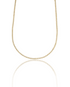 A glittering gold diamond tennis necklace sparkles against a clean white background, reflecting softly on a polished surface.