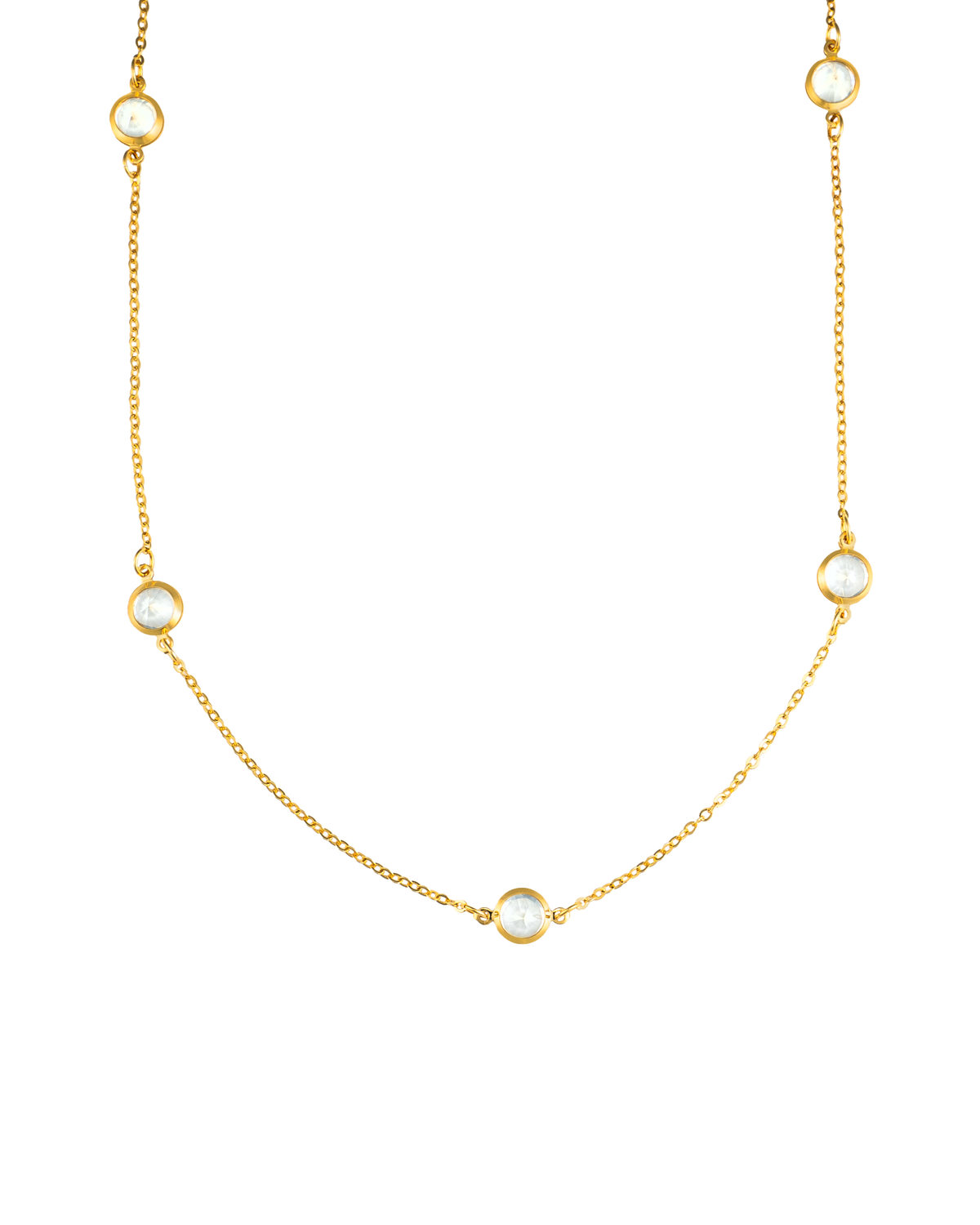A delicate gold chain necklace features sparkling bezel-set crystals spaced evenly along its length.