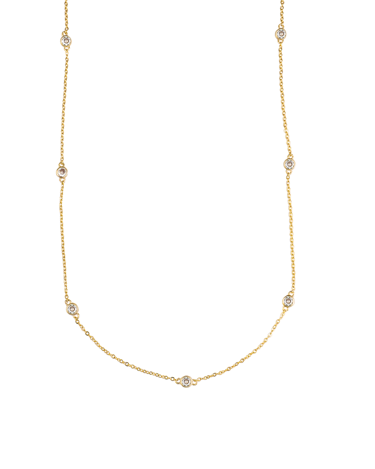A delicate yellow gold station necklace features bezel-set diamond stations spaced evenly along the chain against a clean white background.