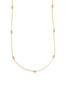 A delicate yellow gold station necklace features bezel-set diamond stations spaced evenly along the chain against a clean white background.