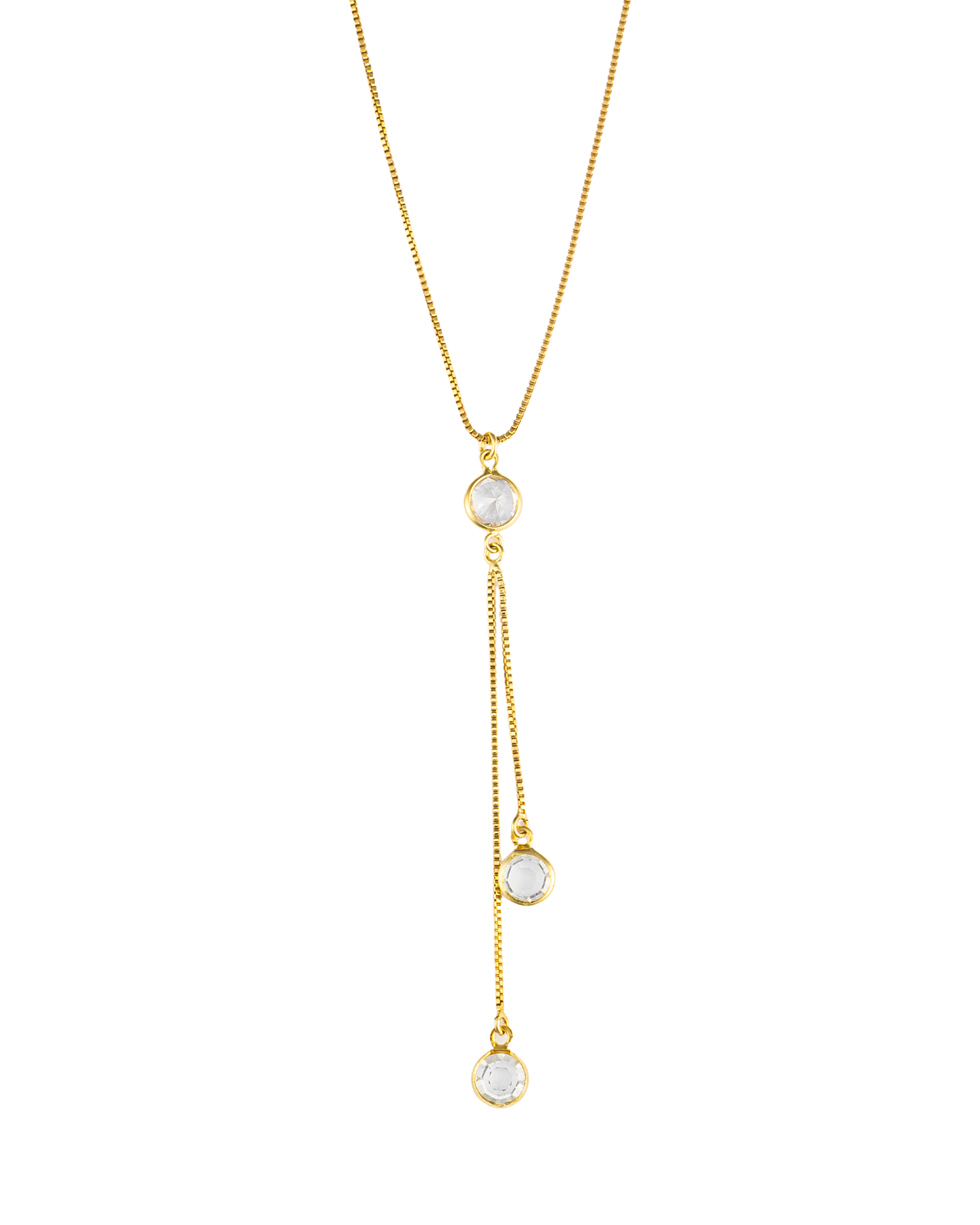 A delicate gold lariat necklace sparkles with three bezel-set crystal pendants against a clean white background.