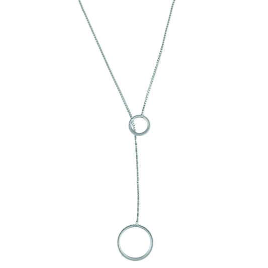 A delicate silver lariat necklace features a fine box chain passing through a small circle with a larger matching ring dangling at the end.