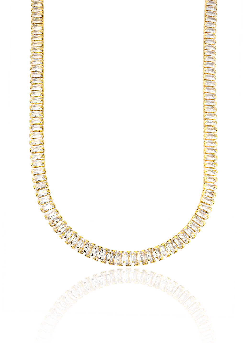 A dazzling gold tennis necklace featuring a continuous row of sparkling baguette-cut cubic zirconia stones is displayed on a clean white background with a subtle reflection.