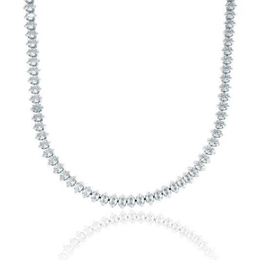 A sparkling diamond tennis necklace featuring marquise-cut stones sparkles against a clean white background.