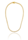 A sparkling gold tennis necklace features square-cut cubic zirconia stones and rests in a circular display with a clear reflection below.