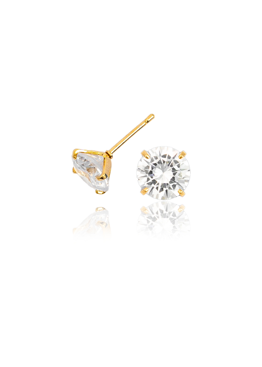 A pair of sparkling solitaire diamond stud earrings in gold settings rest on a reflective surface against a clean white background.
