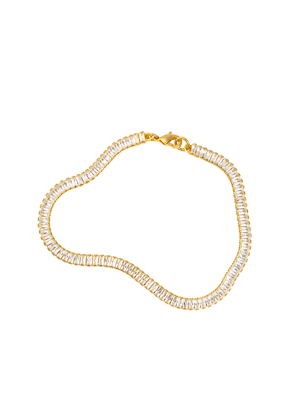 A gold baguette-cut tennis bracelet with sparkling cubic zirconia stones rests in a curved shape against a white background.