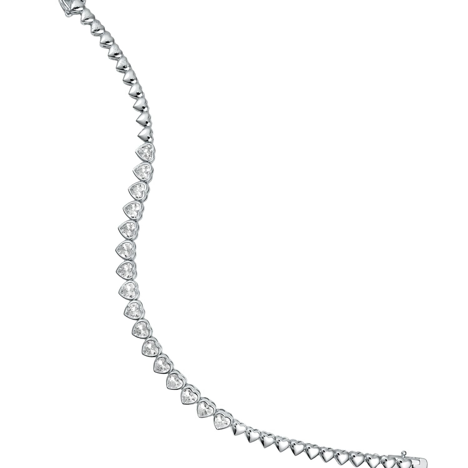 A delicate silver heart tennis bracelet curves gracefully against a clean white background, showcasing shimmering crystal-set heart links.