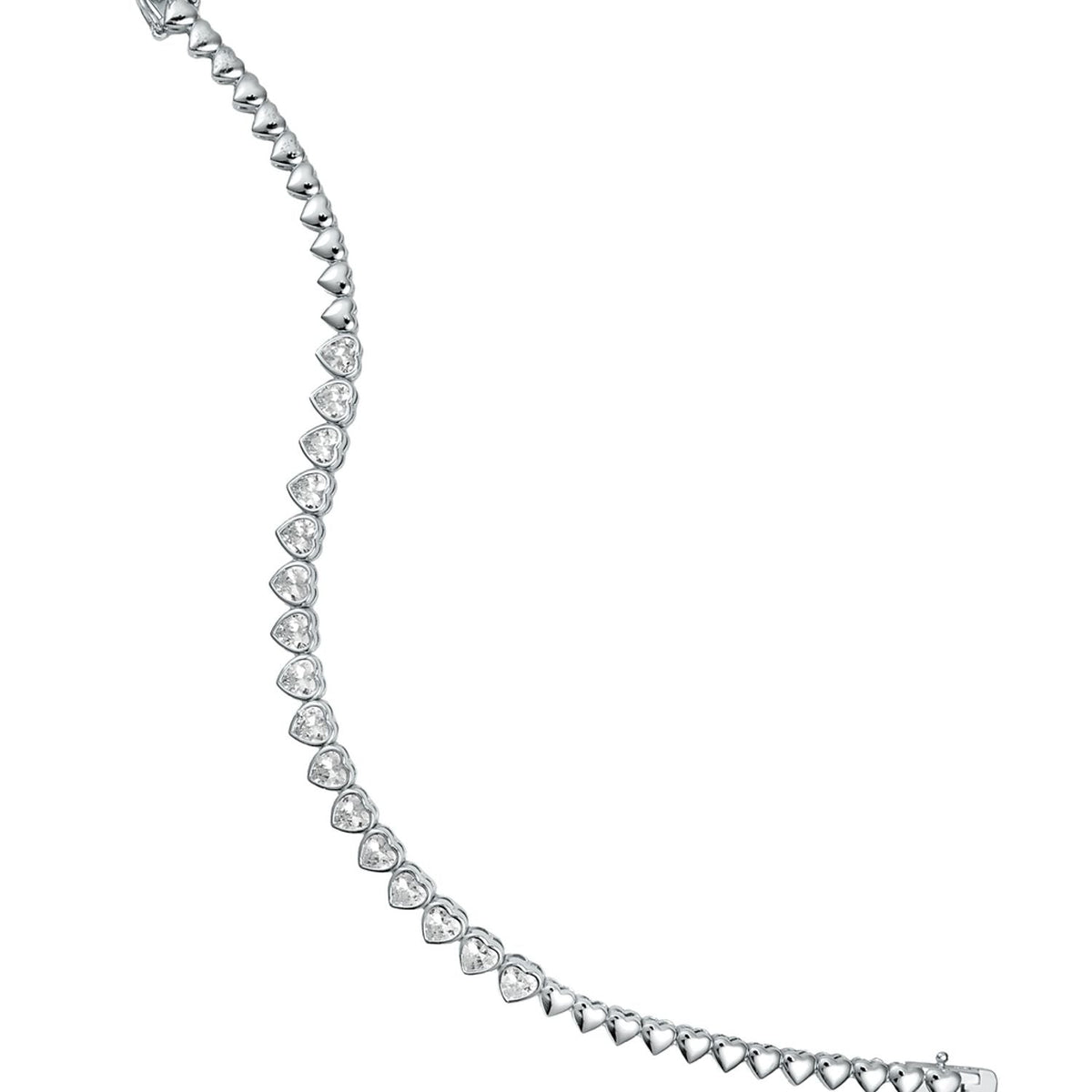 A sparkling silver tennis bracelet made of interlocking heart-shaped cubic zirconia stones curves gracefully against a white background.