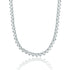 A sparkling silver tennis necklace features a continuous strand of bezel-set heart-cut cubic zirconia stones against a white background.