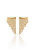 A pair of gold crystal tassel earrings sparkles against a clean white background, reflecting softly on the surface below.